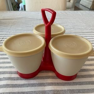 Vintage Tupperware condiment caddy in paprika red.